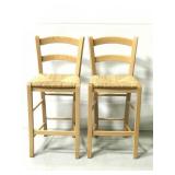 Pair of wooden chairs w/ woven seat