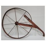 Vintage metal tractor wheel yard art