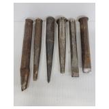Six assorted metal chisels