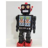 Vintage battery operated tin robot toy