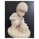 Chalkware little boy statue