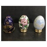 Three decorative enameled eggs