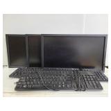 Three Dell monitors and 3 keyboards
