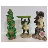 Three resin and ceramic frog decor figures