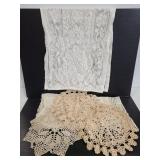 Vintage crocheted doilies and table runners