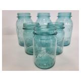 Six blue Ball mason jars