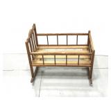 Vintage wooden rocking baby crib