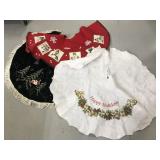 Three vintage tree skirts