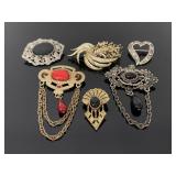 Collection of 6 vintage brooches