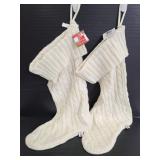 Pair of white sweater dei Christmas stockings