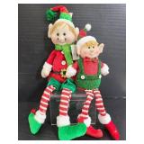 Pair of plush sitting Christmas elves