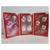 Three boxes of pink glass ball Christmas ornaments