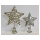 Two glittery Christmas tree toppers