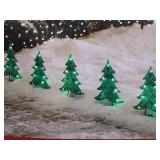 Five twinkling tree path lights