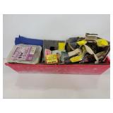 Plastic container of assorted hardware