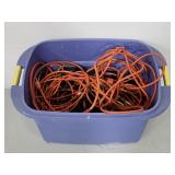 Tote of assorted power cables