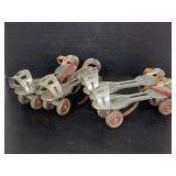 Two pairs Globe Skate Corp vintage roller skates