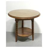 Wooden end table with glass top