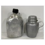 Two vintage aluminum canteens