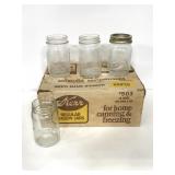 Twelve vintage glass mason jars