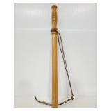 Wood batton on leather cord