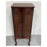 Mahogany finish two-door jewelry armoire