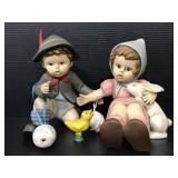 Pair of ceramic boy & girl figures