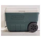 Dark green Coleman cooler