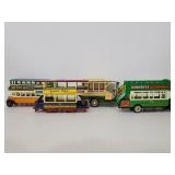 Four Matchbox collectibles die cast buses