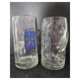 Two large glass beer mugs