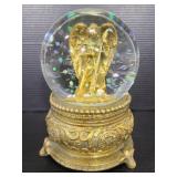 Hold tone glitter angel water snow globe
