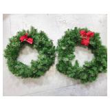 Two 25in wreaths with poinsettias