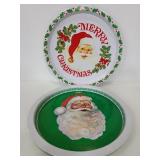 Two vintage metal round Santa trays