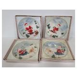 Set of four decorative santa plates