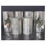 Six tin candle holders