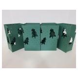 Six metal Christmas tree candle luminaries