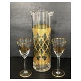 Clear glass gold decorated vase & stemmed glasses