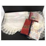 Embroidered runner, cloth napkins, and linens