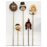 Five assorted wooden Thanksgiving holiday stakes