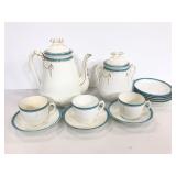 White ceramic blue and gold tea set