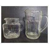Two glass pitchers