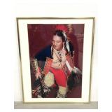 Gold framed Indian musician picture