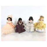 Four assorted Madam Alexander dolls on stands