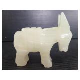 Small carved stone donkey