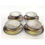 Four painted iridescent Japanese tea cups/ saucers