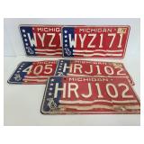 Five 1976 Michigan license plates