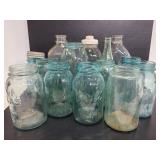 Collection of vintage glass jars mostly Ball