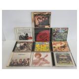 Ten assorted CDs