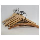 Twelve wood clothes hangers