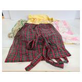 Four assorted homemade aprons